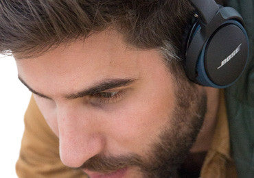 Earbuds are the smallest headphones which block out the noise pretty well